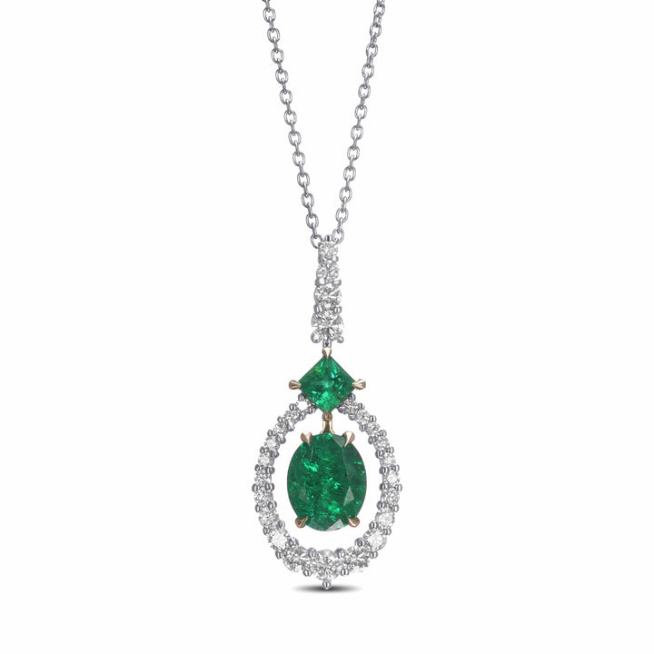 Oval Muzo Emerald and Diamond Halo Pendant Brand Necklace